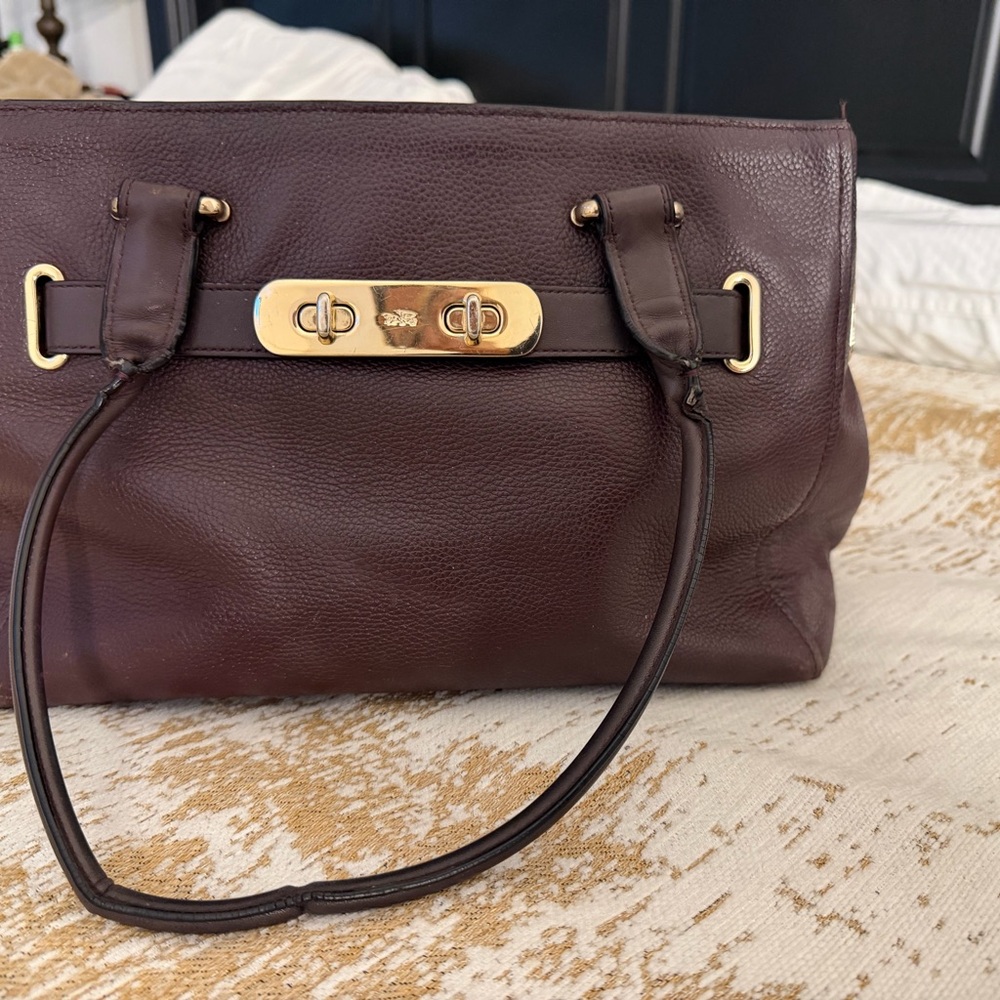 Coach Pebbled Leather Shoulder Bag in burgundy color with Gold Hardware